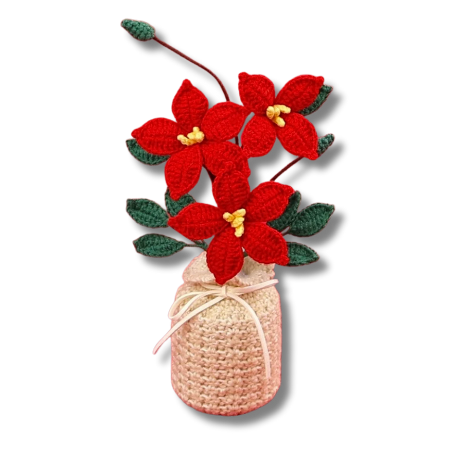 Gehäkelter Weihnachtsstern in gehäkelter Vase